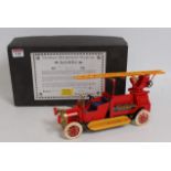 A Tucher & Walther reproduction tinplate model of a Deutz tinplate and clockwork fire engine,