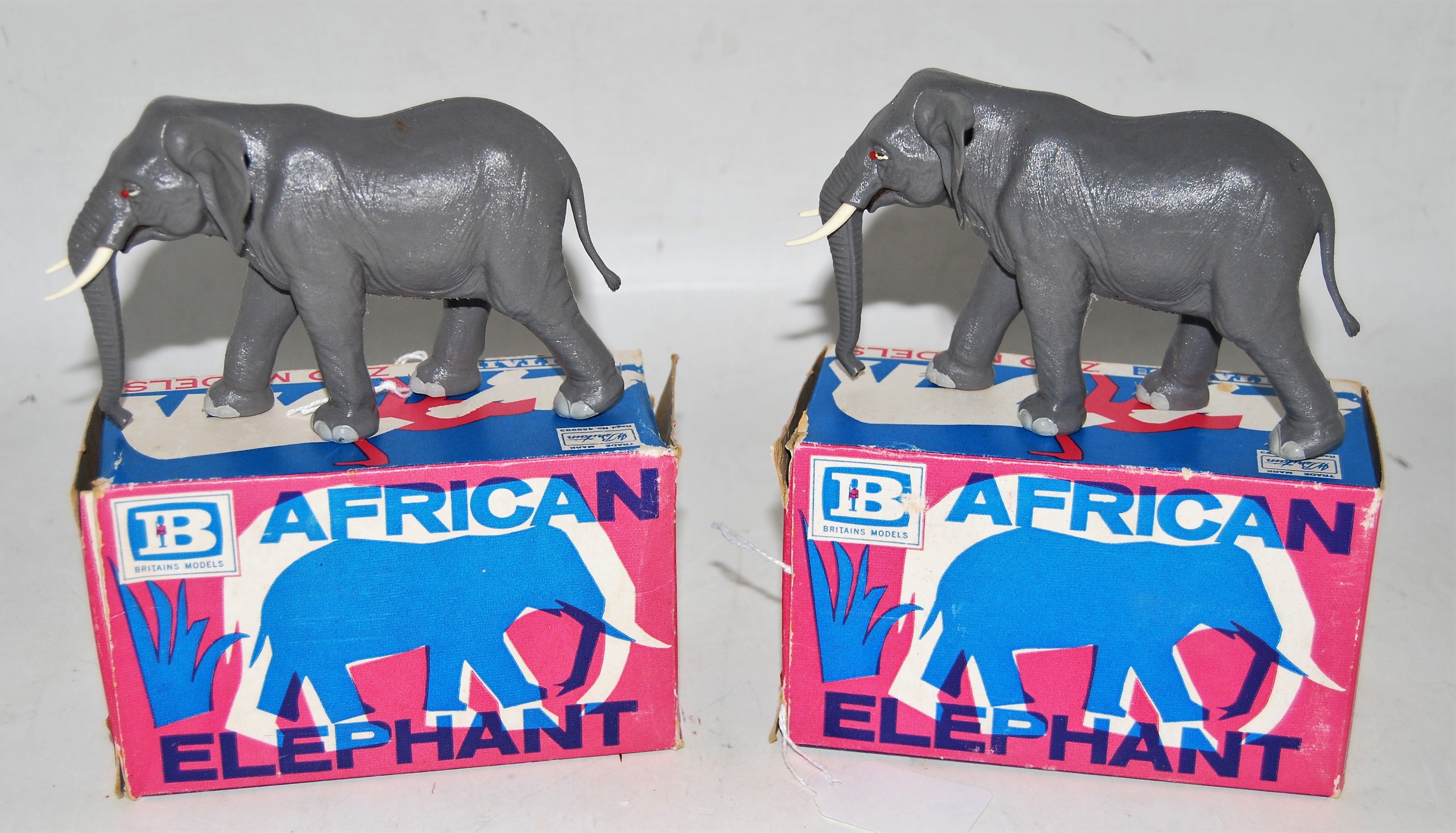 A Britains Zoo Models series plastic African elephant boxed group, two examples, both catalogue