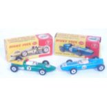 A Dinky Toys boxed racing car diecast group to include No. 240 Cooper racing car comprising two-tone