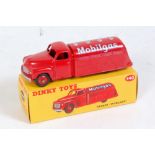 A Dinky Toys No. 440 Mobil Gas petrol tanker comprising of red body with red hubs and Mobil Gas