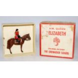 A Britains No. 2065 HM Queen Elizabeth The Grenadier Guards mounted side saddle, single issue figure