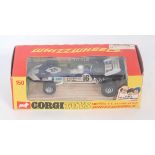 A Corgi Toys No. 150 Surtees TS9 F1 racing car, comprising of dark metallic blue and white body with