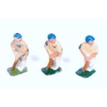 An F Kew & Co collection of three various lead hollow cast cricket batsmen, all wearing whites