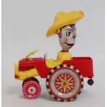 A Marx tinplate and plastic clockwork model of Sam the Sheriff Crazy Cowboy clockwork car, loose