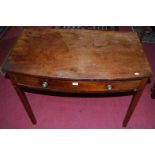 An early 19th century mahogany bowfront single drawer side table, width 92.5cm