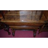 A 19th century provincial rustic elm and oak doughbin, having removable lid, length 104cm