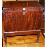 An early 19th century mahogany hinged top cellarette, the interior compartment fitted for eight