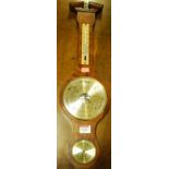 A three dial aneroid wheel barometer