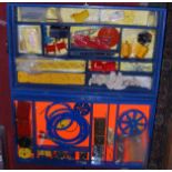 A made-up wooden Meccano storage chest, containing a quantity of mixed Meccano, to include blue, red