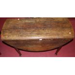 An early 19th century provincial oak drop leaf table