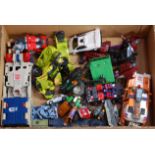 One tray containing a quantity of plastic and diecast Transformers and other TV related