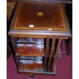 An Edwardian mahogany and satinwood inlaid revolving bookcase having eight divisions, width 48cm