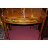 A circa 1900 mahogany rosewood crossbanded and further box wood strung bowfront single drawer side