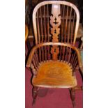 An early 20th century elm seat and beech splat back Windsor rocking armchair, width 55cm