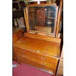 An Edwardian mahogany and satinwood inlaid mirror back dressing chest, width 107cm