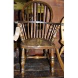 A stained elm seat and beech child's stickback Windsor chair, width 40cm