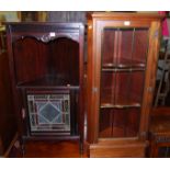 An Edwardian mahogany and coloured glass lead glazed inset single door low corner cupboard, height