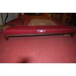 A late 19th century mahogany framed and upholstered long footstool, length 108cm, together with a