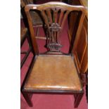 A set of six Hepplewhite style mahogany dining chairs, each having tan leather upholstered drop-in