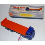 A Dinky Toys No.903 Foden flat truck with tailboard, comprising second type dark blue cab and