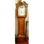 A circa 1800 provincial oak and mahogany crossbanded long case clock, the painted arch dial signed T