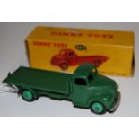 A Dinky Toys No.422 Fordson Thames flat truck, finished in two-tone green, sold in the original