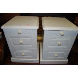 A pair of white wood round cornered three-drawer bedside chests, width 44cm