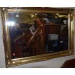 A contemporary gilt bevelled rectangular wall mirror, 75x105cm