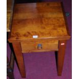 A contemporary hardwood low single drawer lamp table, width 45cm