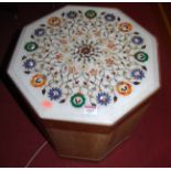 A contemporary marble topped and copper bound octagonal low occasional table, fitted for