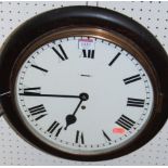 A Victorian stained wood circular wall clock, having white enamel dial, single winding hole, with