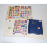 Three albums containing world stamps