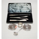 A lady's silver handled dressing table set, to include button hook and glove stretchers (missing