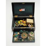 An early 20th century leather clad jewellery box and contents, to include a Komai style white and