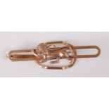 A 9ct gold British Lions tie-clip, 11.6g, sponsor E.T., 70mm. This tie-clip reputedly belonged to
