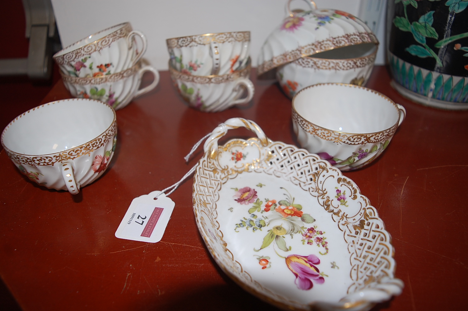 An early 20th century Dresden porcelain part tea service, of Wythern form, painted with roses and - Image 2 of 3