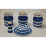 A small collection of Cornish ware table wares in the electric blue pattern to include three storage