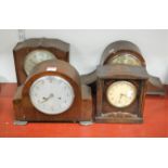 A 1950s Enfield oak cased mantel clock, having silvered dial with Arabic numerals, eight day