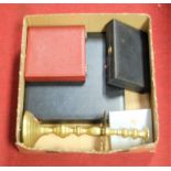 A box of miscellaneous items, to include cased cutlery, brass candlestick etc