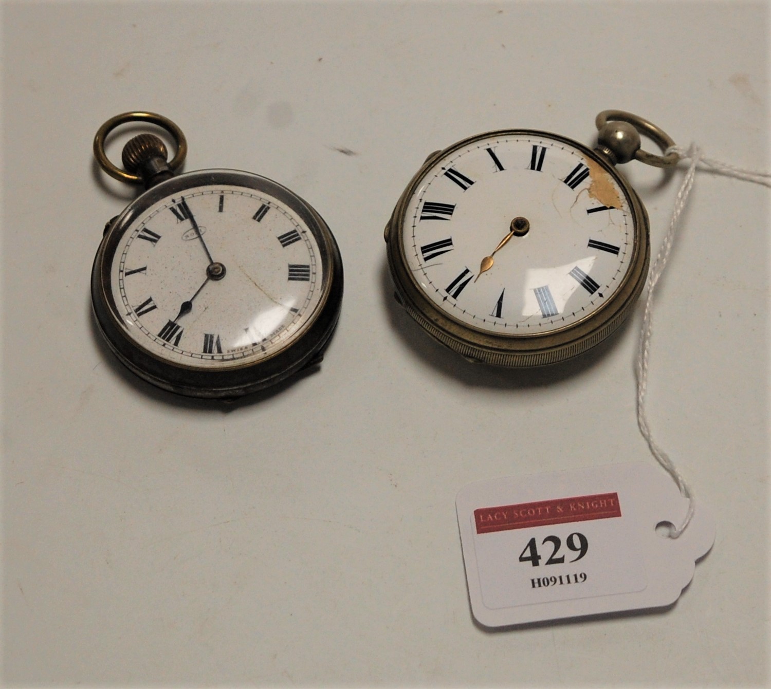 An early 20th century nickel cased open faced pocket watch, having an enamelled dial with Roman