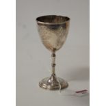 A Victorian silver goblet, having bright cut decoration to a knopped stem and circular footrim, h.