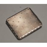 A mid-20th century sterling silver pocket ***COMPACT*** case, of rectangular form, having engine