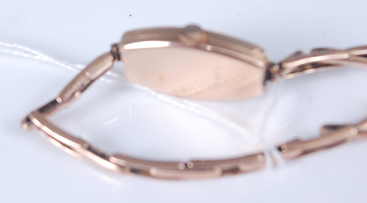 A 9ct yellow gold manual wind wristwatch, with sprung metal bracelet and oval discoloured Arabic - Image 2 of 3