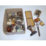 A collection of miscellaneous items, to include inkwells, lighters, photograph frames, napkin