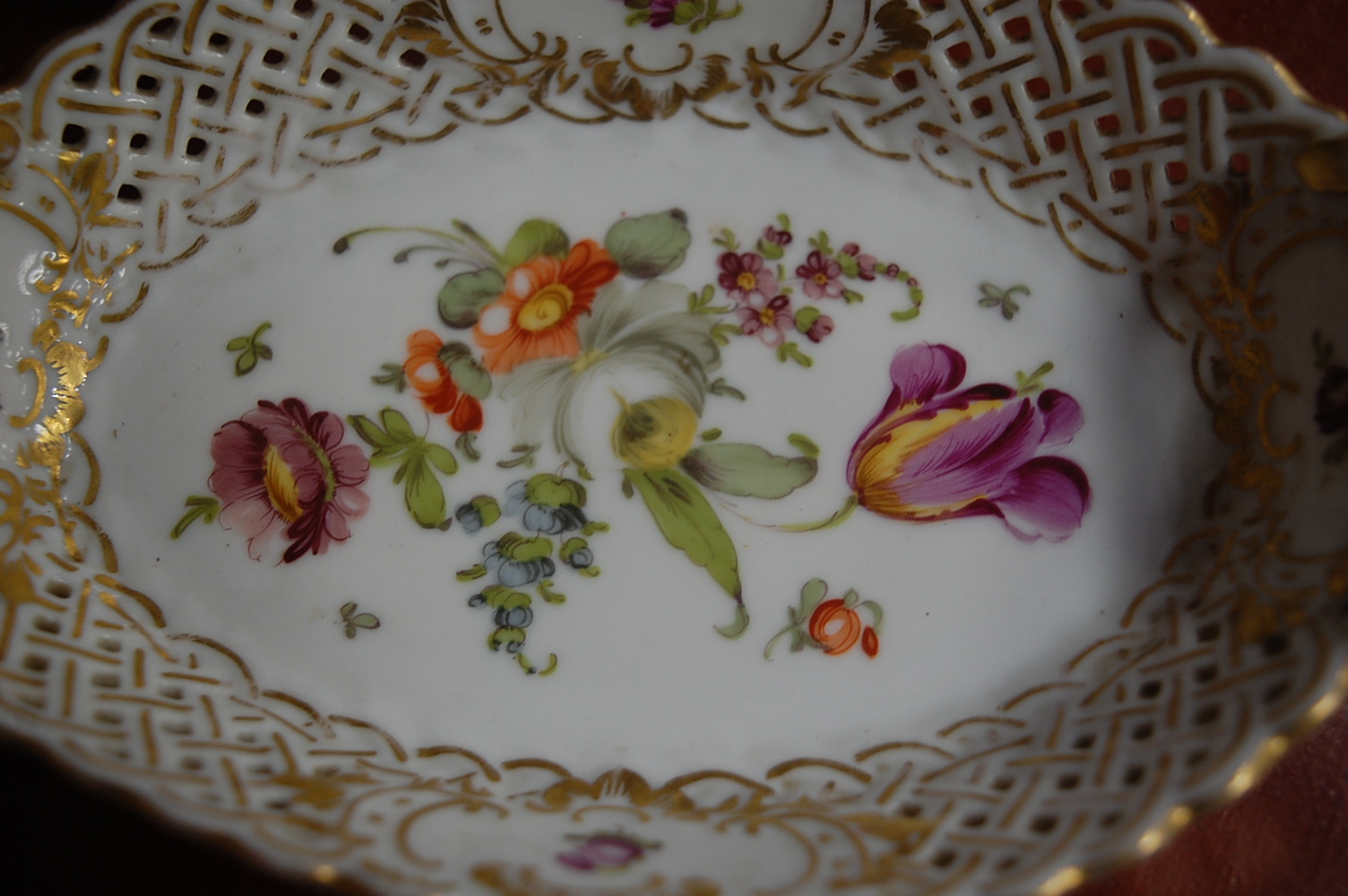 An early 20th century Dresden porcelain part tea service, of Wythern form, painted with roses and - Image 3 of 3