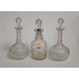 A Regency cut glass triple neck decanter, having star cut base and balloon shaped stopper;