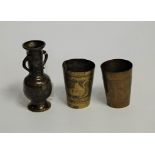 A bronzed vase, having flared rim, tapering neck and bulbous lower body, relief decorated with