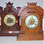 An early 20th century oak cased eight day mantel clock, the enamelled chapter ring having Roman