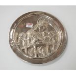 A modern filled silver dish, the centre relief decorated with Madonna and Child, by the Pobjoy