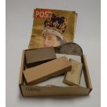 A box of miscellaneous items to include faux peal choker, various loose stamps, commemorative